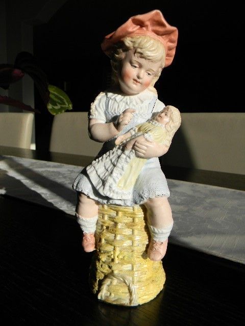 Lovely Antique Heubach Bisque Piano Baby Girl Figurine with Her Doll