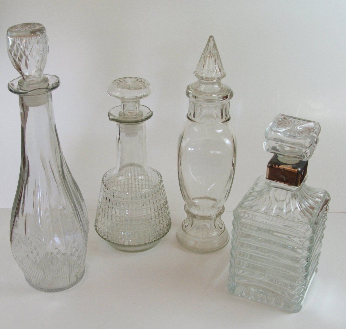 Lot of 4 Fancy Clear Glass Decanters w Stoppers Whiskey Brandy L K
